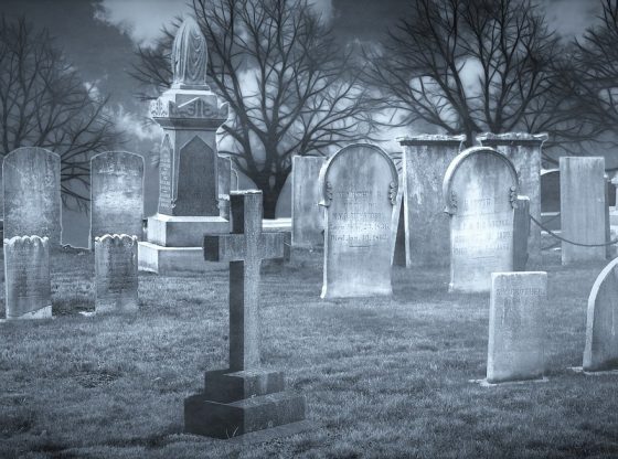 Picture of old gravestones in a cemetery